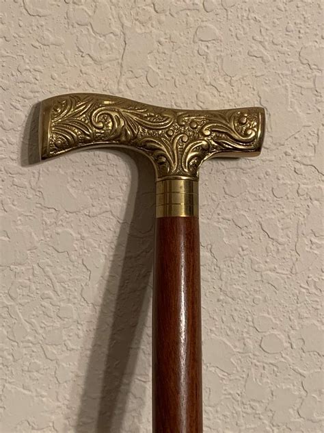 1k) 26. . Brass handle cane